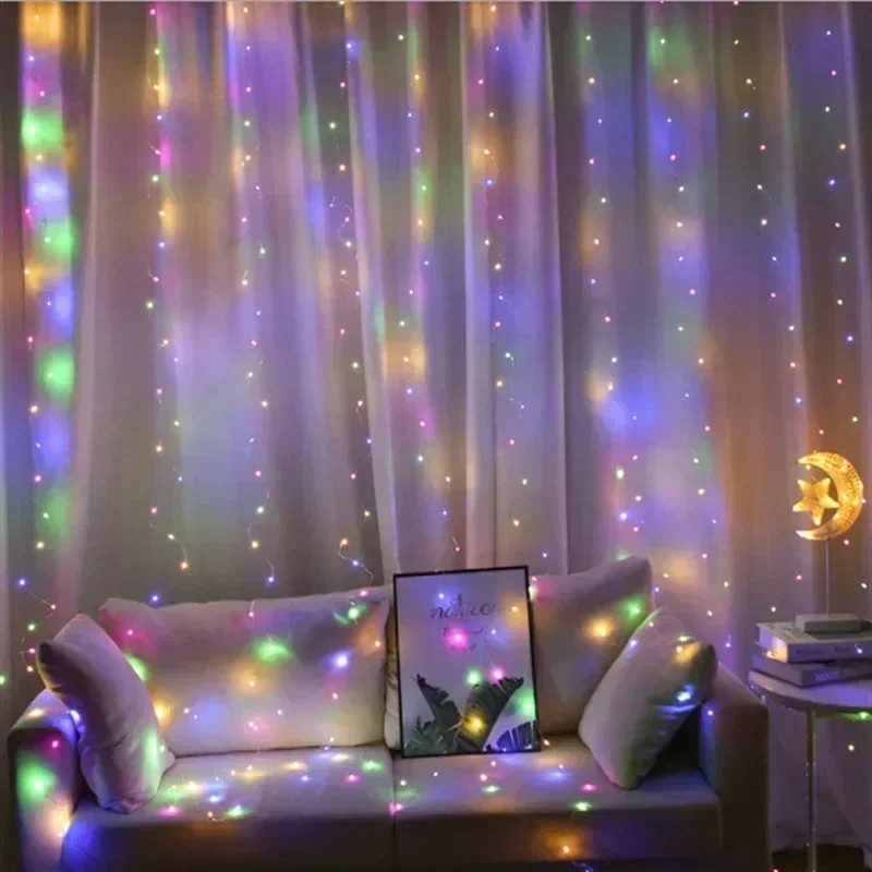 Decorative string lights on a curtain with a cozy living room setting.